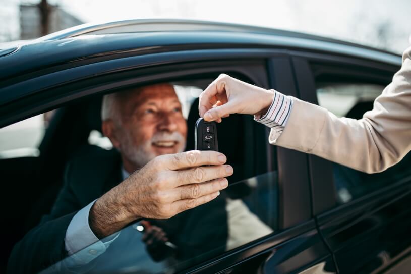 Financing - Old Man Getting Key For Car