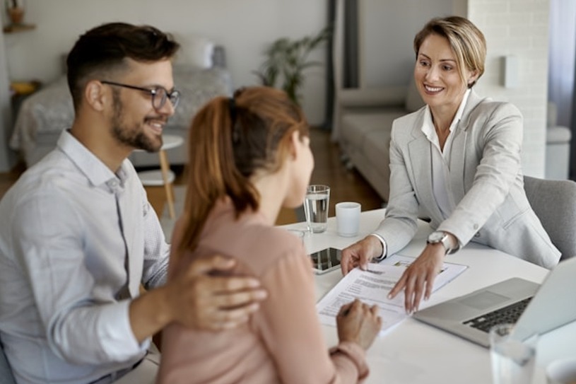 Leasing agent explaining the advantages of leasing for the couples