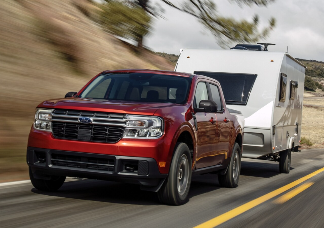 Used Ford Maverick in red running with front view