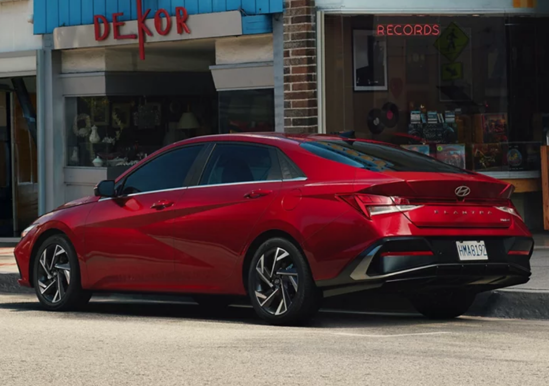 (used) Hyundai Elantra in red parking on street